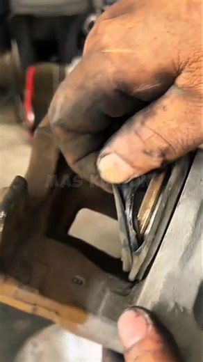 Professional ways to remove a stuck brake piston.
