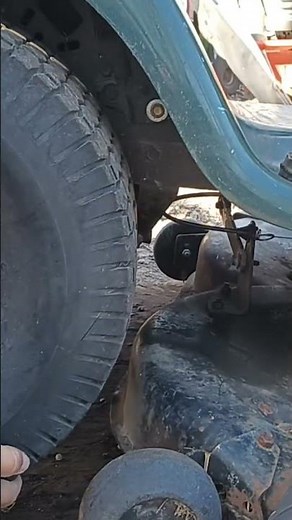 easily remove the Right rear wheel from a Craftsman LT1000 without taking the deck wheel off.