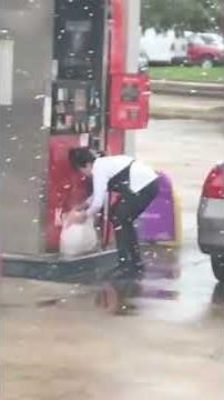Woman Tries to Carry Gas in Plastic Bag to Her Car's Trunk - 1090700