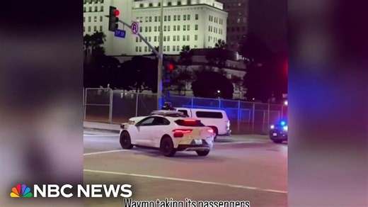 Tesla drives into active police standoff
