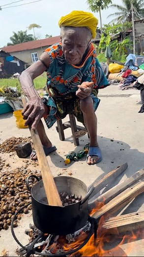 Mama Alice Udok — 88 and Still Fighting to Survive I met 88-year-old Mama Alice Udok while going to do charity for someone else. She was sitting by the roadside, breaking canel nuts her only means of survival. At her age, Mama should be resting, not doing such hard work to survive. When I asked about her family, she told me she had four children, but they’re all gone. That broke my heart. Mama used to be a nurse but now lives alone in a poor environment, surviving on her canel oil business and a