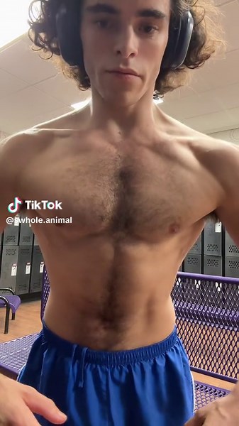 Muscle Flexing in Gym: A Strong Workout Display