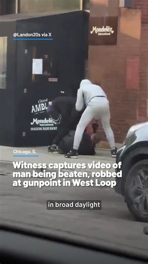 A witness inside an Uber captured cell phone video of a 49-year-old man being beaten and robbed at gunpoint in Chicago's West Loop neighborhood. Video shows the suspects fleeing into an unknown SUV. Detectives are now investigating the incident. #chicago #westloop #robbery #witness #caughtoncamera | NBC Chicago