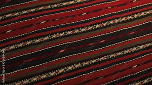 Large oriental rug with colorful patterns. Handmade rug production, carpet close-up with all the details