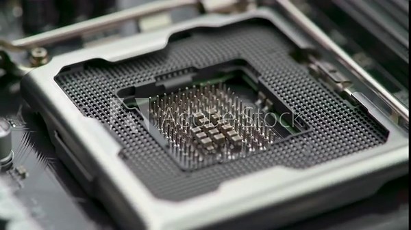 CPU socket pins on a motherboard, closeup showing design, assembly and component connection detail