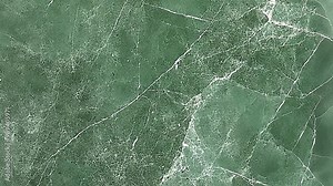 Explore the intricate patterns and vibrant colors of green marble, showcasing its unique veining and rich textures, perfect for design inspiration.