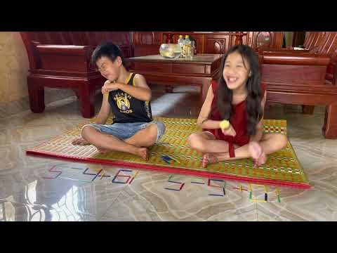 #74 the thinking game involves moving counting sticks to perform the correct calculation.