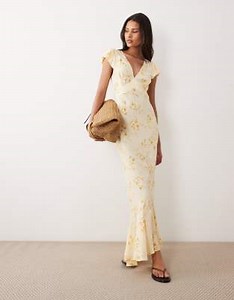 Vestido de tarde largo amarillo con estampado floral, cuello de pico y mangas abullonadas de ASOS DESIGN | ASOS