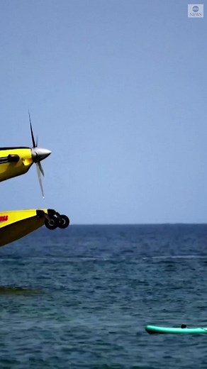 A Spanish firefighting seaplane touched down in the Mediterranean, surprising swimmers and paddleboarders, as it refilled water to battle wildfires raging across the Valencia region. https://abcn.ws/3QIr1Wu | ABC News