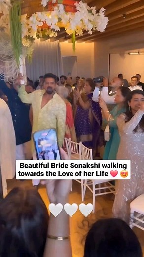 12K views · 180 reactions | The bride makes a majestic entrance on her wedding day, walking down the aisle with grace and beauty #sonakshisinha #yk__magazine_ #fashionfront09 | YK Magazine | Facebook