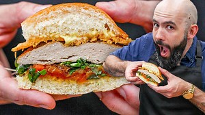 Andrew Rea of the "Binging with Babish" YouTube channel recreates Chris Traeger’s "East Meets West" turkey burger from Parks and Recreation. This dressed up turkey burger is stacked with homemade black truffle aioli, a parmesan and fontina cheese crisp, and papaya saffron chutney. Check out the recipe here: https://vice.video/33CzZMq | How-To