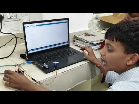 Control dc motor using ultrasonic sensor with Arduino board