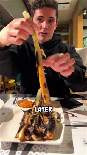 How Spaniards Roast Whole Green Onions Over an Open Fire