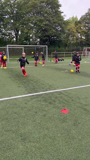 Children's Soccer Training Session on Artificial Turf