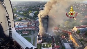 Fire rages through Milan residential tower block