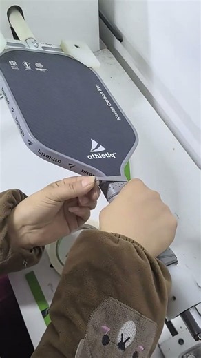Inside the factory: hand-wrapping the grip on a premium pickleball paddle 🏓
