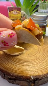 Tiny Taco Tuesday 🌮 throwback to the summer where I made ground beef tacos with cheese, salsa and jalepenos in the mini kitchen! What’s your fave taco ? What tiny food should I make next ? #tacotuesday #tiny #taco #cooking | My Mini Bakes