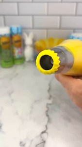 Sultan sunflowers 🌻💛🧁 🌻 Use the @wiltoncakes sultan tip to pipe yellow buttercream onto your cupcakes. 🧁 Place the cupcakes in the fridge or freezer to firm up the buttercream. 💛 Remove from the fridge or freezer. 🥰 Use the large end of a large piping tip to make the hole bigger. 🫶🏻 Use piping tip twelve to add chocolate buttercream into the hole. 🍫 Pour crushed Oreos into the top of the hole. ☘️ Use piping tips 366 and 352 and green buttercream to add leaves around the edges. #cupcake