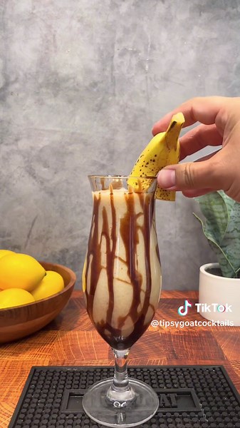 Dirty Banana 🍌 Ingredients - 2oz Creme de Banana - 2oz White Rum - 1oz Kahlua - 2oz Milk - 1 Ripe Banana - Chocolate Syrup and Whipped Cream #cocktailrecipes #cocktails #cocktail #drinkrecipes #drinks #mixology #cocktailtime #drink #drinktok #cocktails30sec