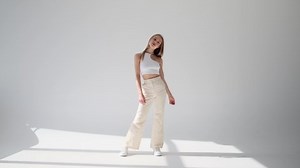 Female model posing over white background