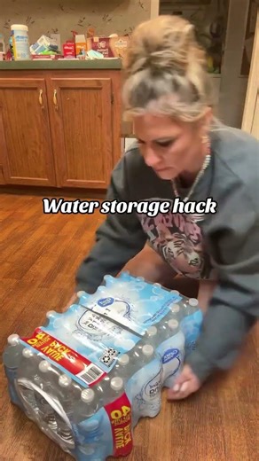 Easiest way to get water out of the big packs! U can stack them or even set in ur fridge this way.