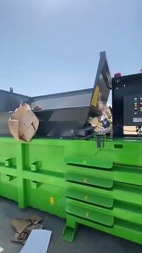 Watch the new H80 horizontal baler being loaded with cardboard for the first time
