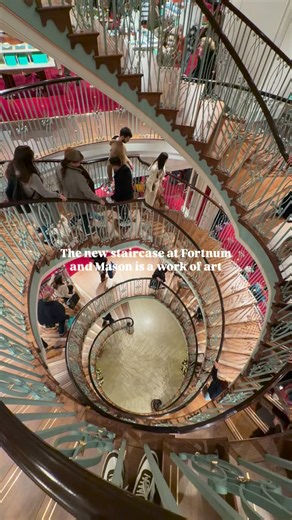 Have you seen the stunning new staircase at @fortnums? 😍✨ The new double-helix staircase is a handcrafted masterpiece which spans over three storeys at the iconic department store. Can you believe it took two years to built it? | Prettylittlelondon