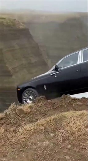 Luxury Car Rolls Off a Cliff!