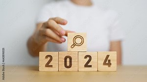 2024 block with magnifying glass icon. SEO, Search Engine Optimization, hiring , Advertising, Idea, Strategy, marketing, Keyword, Content and New Year start concepts