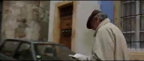 RONIN (1998)A sneaky 'hidden cut' occurs when an extra walks past the camera to wipe the frame. The first shot is one location and the second shot is in a completely different part of the French town. A cool way to seamlessly connect different real-world locations.