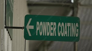 powder coating room in the manufacturing plant. powder coating marks at the factory. powder coating room sign