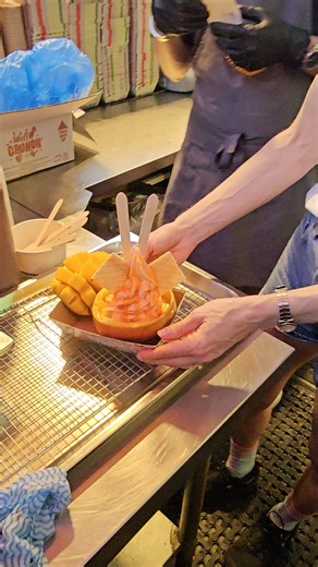 Annnnnnd here it is 🥭 the 2024 Mango Soft Serve Salad 🥗 Very LARGE MANGOS filled w/. Mango Soft Serve & Mango Coulis. ONLY AT KOMBIALLEY | Eat Street Northshore