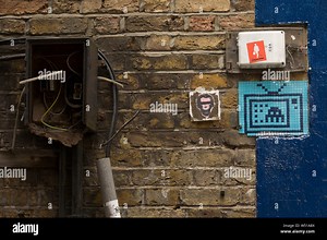 A mosaic by ’Invader’ well-known French street artist, whose street mosaics are modelled on the crude pixellation of 1970s–1980s video games. He took Stock Photo - Alamy