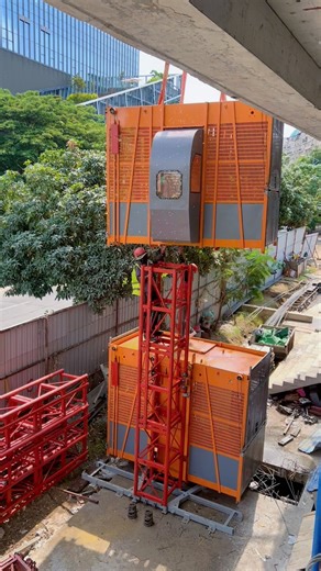 Installing Material Hoist and Passenger Hoist for Building.#constructionchannel #shortvideo#engineer