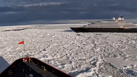 Icebreaker aids stranded cruise ship in Antarctica's Ross Sea