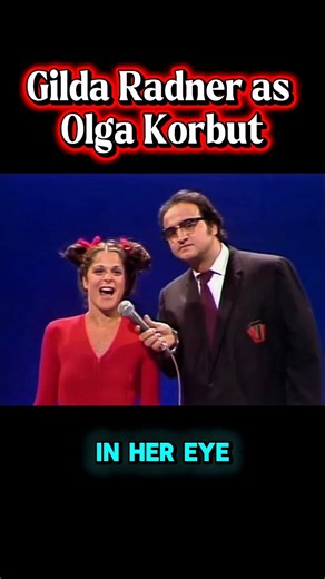 Gilda Radner as the legend Olga Korbut and John Belushi on 1970s SNL. These two crack me up in their role about the Olympics. #SNL #saturdaynightlive #gildaradner #johnbelushi #comedy #comedians #OlgaKorbut #Olympics #throwback #1970s #lovegilda | Love Gilda
