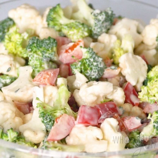 Low carb broccoli cauliflower salad takes just 10 minutes! This easy salad recipe is super simple, colorful, and great for any occasion! Recipe --> https://www.wholesomeyum.com/low-carb-broccoli-cauliflower-salad/ | Wholesome Yum - Easy Healthy Recipes