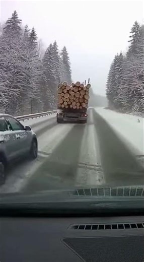 Logging Truck Loses Control on Icy Highway