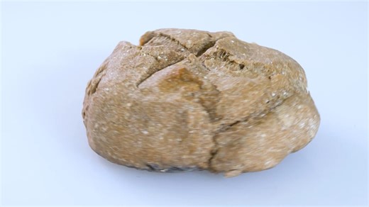 Watch primitive bread making reveal the backbreaking work that built the ancient world