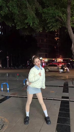 Chinese Girl Taking Selfies on the Street