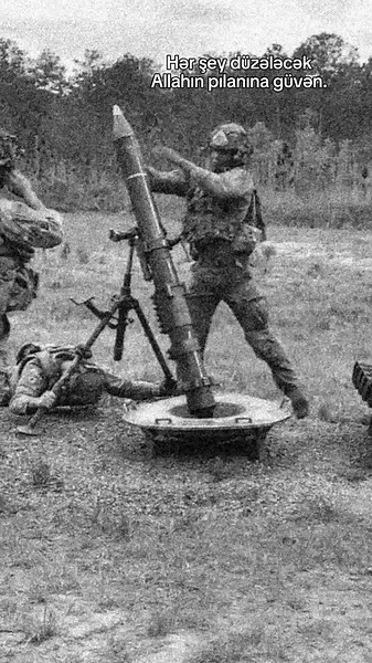Soldiers Operating a Large Mortar System in Training