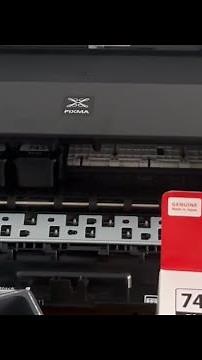 Thay hộp mực mới cho máy in Canon Pixma TS207