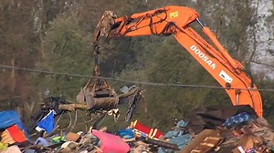 October: Calais 'Jungle' camp is demolished as migrants watch