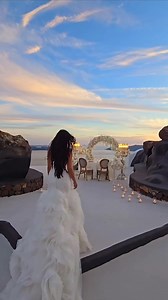 6.9K views · 45 reactions | Calling all Santorini brides-to-be! Dreaming of a wedding on this magical island? From effortlessly elegant to beach goddess vibes, check out our picks to find yourself the perfect dress for your big day: https://weddedwonderland.com/10-practical-yet-stylish-wedding-dresses-to-love-if-youre-tying-the-knot-in-santorini-greece/ Video @wedvisionsstudio | Wedded Wonderland | Facebook