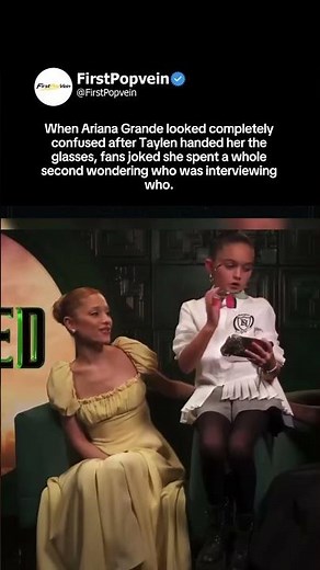 Ariana Grande looks confused with glasses as fans joke she wondered who was interviewing #ariana
