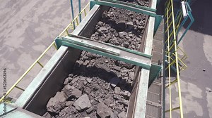 Coal loading. Coal loading at the coal plant. On the conveyor belt.