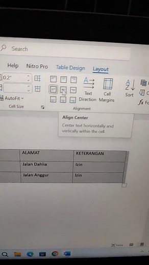 Cara Menengahkan Tulisan di Tabel Microsoft Word