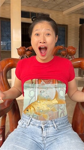What is the monkey holding the fish for?