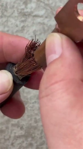 the process of installing a clamp on the end of a cable
