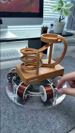 Electromagnetic coil-driven perpetual motion machine